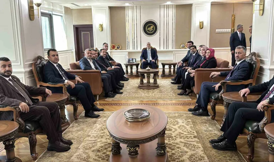 Çalışma ve Sosyal Güvenlik Bakanı Prof. Dr. Vedat Işıkhan, bir